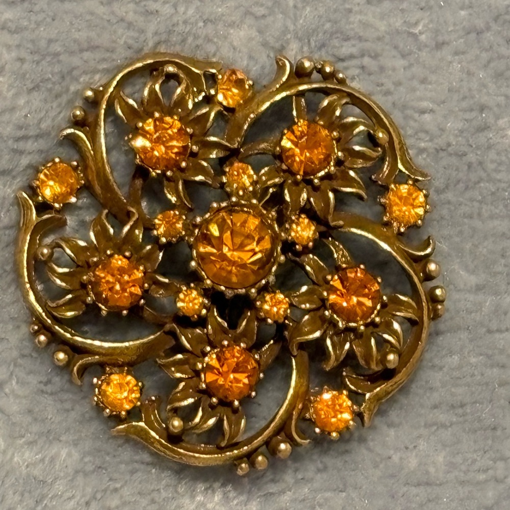 Vintage Coro antiqued gold tone flower swirl Brooch